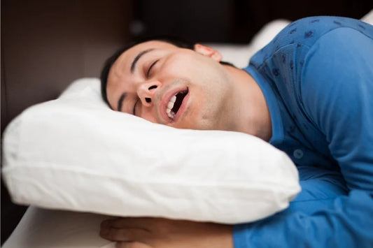 A man snoring while sleeping