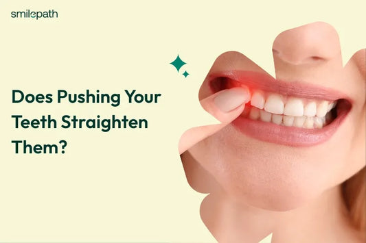 A women showing teeth and pointing at them