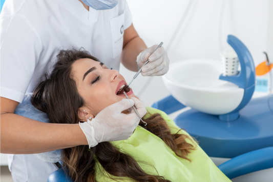 A dentist performing an oral examination