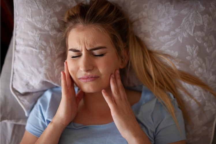 Woman Suffering from Bruxism