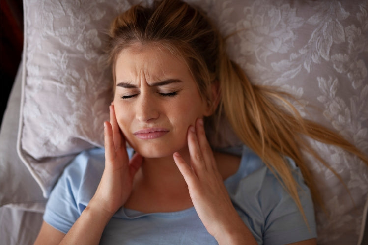 Woman Suffering from Bruxism