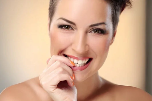 A woman with perfectly straightened teeth