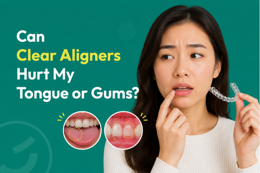 A woman holding a clear aligner with her finger resting on her lip.