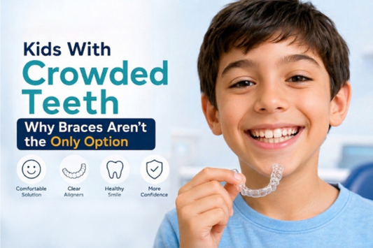 An image shows a boy holding clear aligners to treat crowded teeth