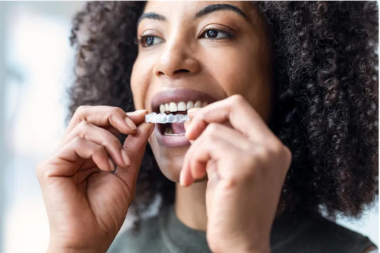  A woman wearing invisible braces.
