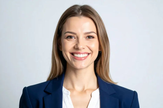  A woman smiling after achieving a picture-perfect smile.