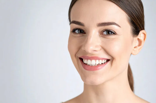 A girl flaunting her perfectly straighter and brighter smile.