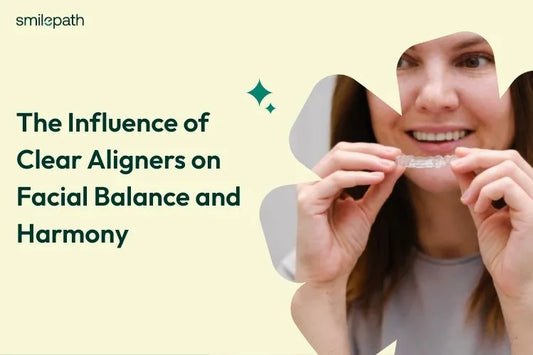 A girl holding invisible aligners in her hands