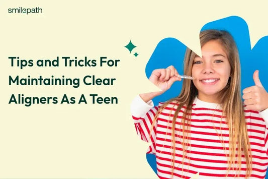 A girl holding clear aligner and rising her thumb up