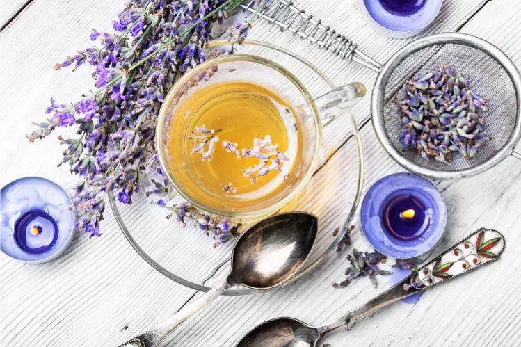 Cup of herbal tea with lavender flowers, creating a calming setting