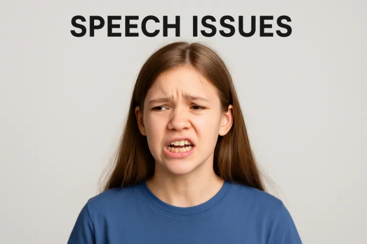 A girl with misaligned teeth trying to speak